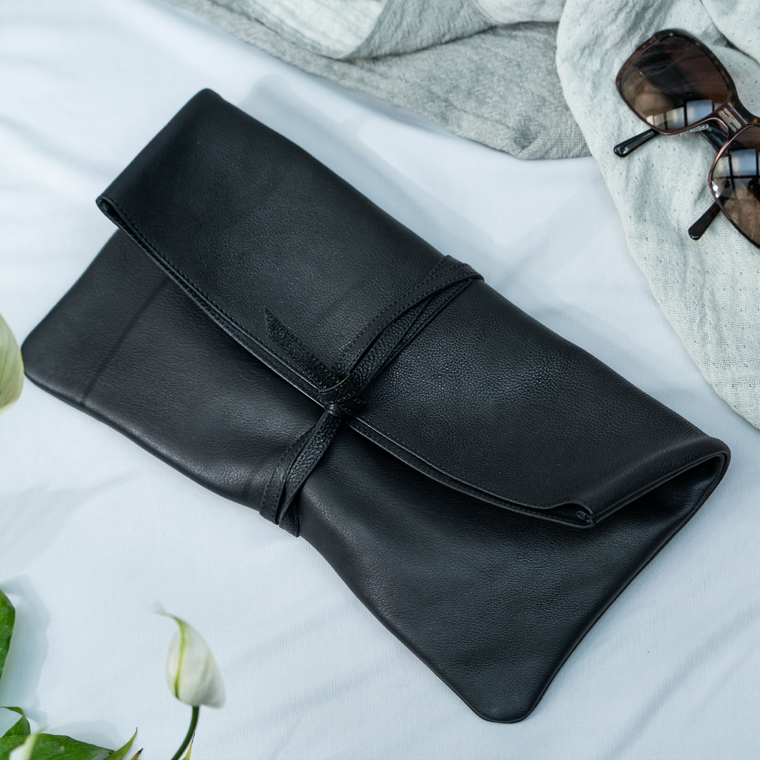 Black leather clutch