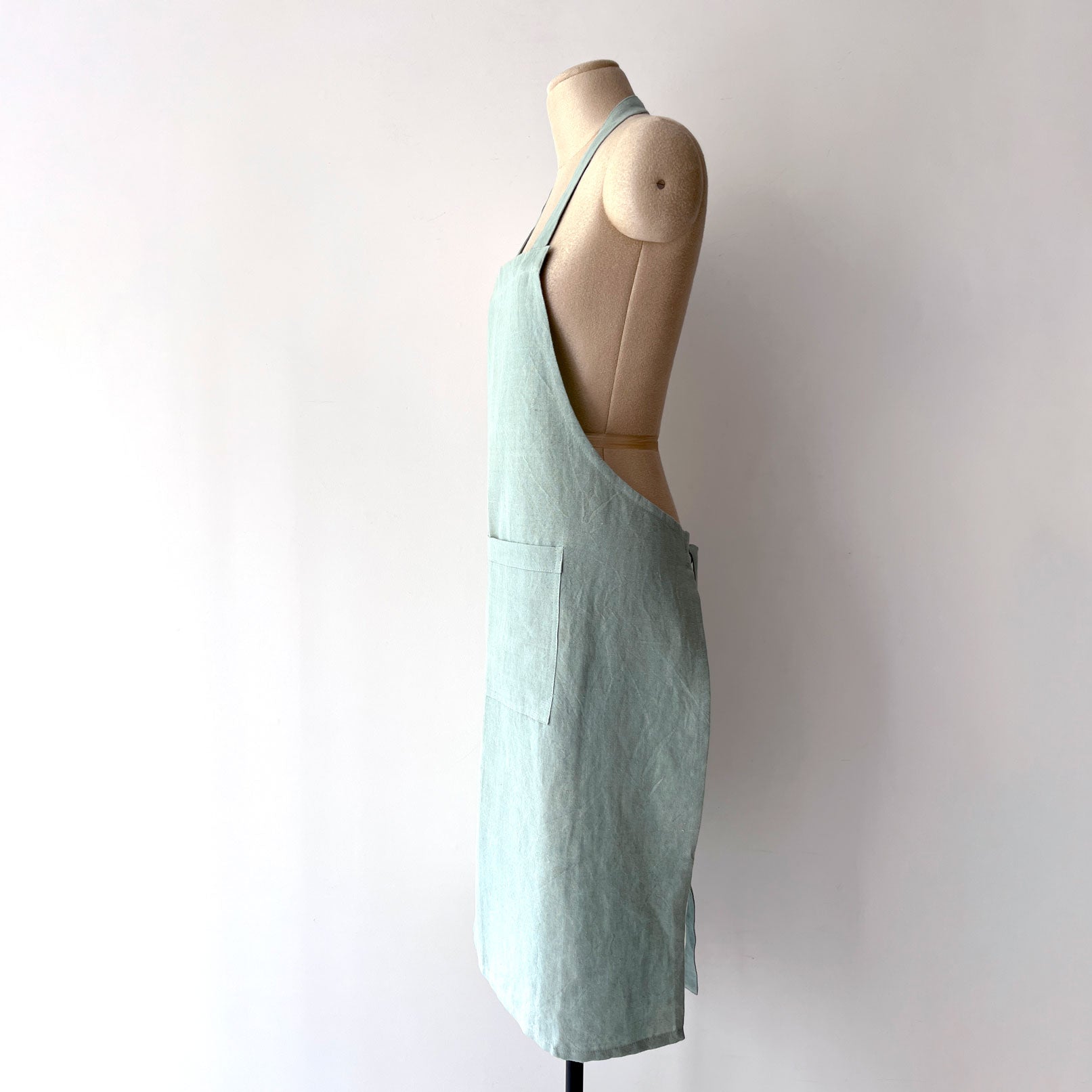Blue Surf Linen Apron in Curved Arm Style 