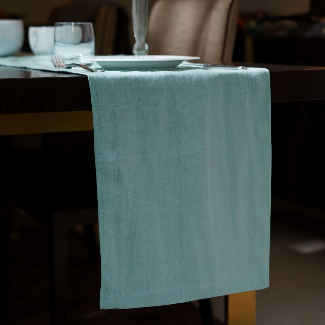 Blue Surf Long Table Runner On a Wooden Table