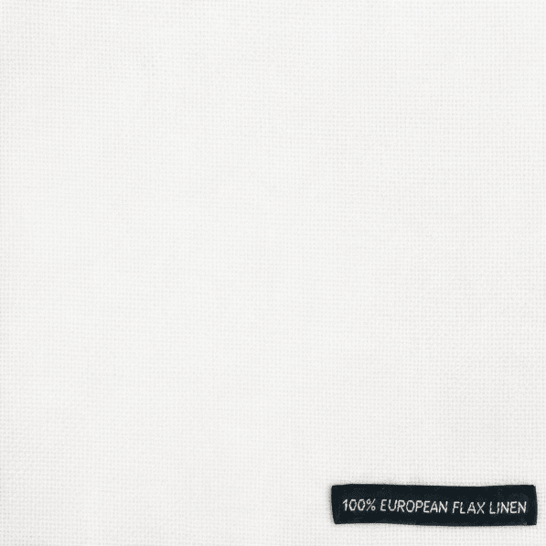 Label on white fabric indicating '100% Belgian Linen'.
