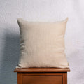 Natural (Beige) Linen Cushion Cover on a Table