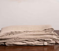 Natural (Beige) Linen Duvet Covers On a Wooden Table