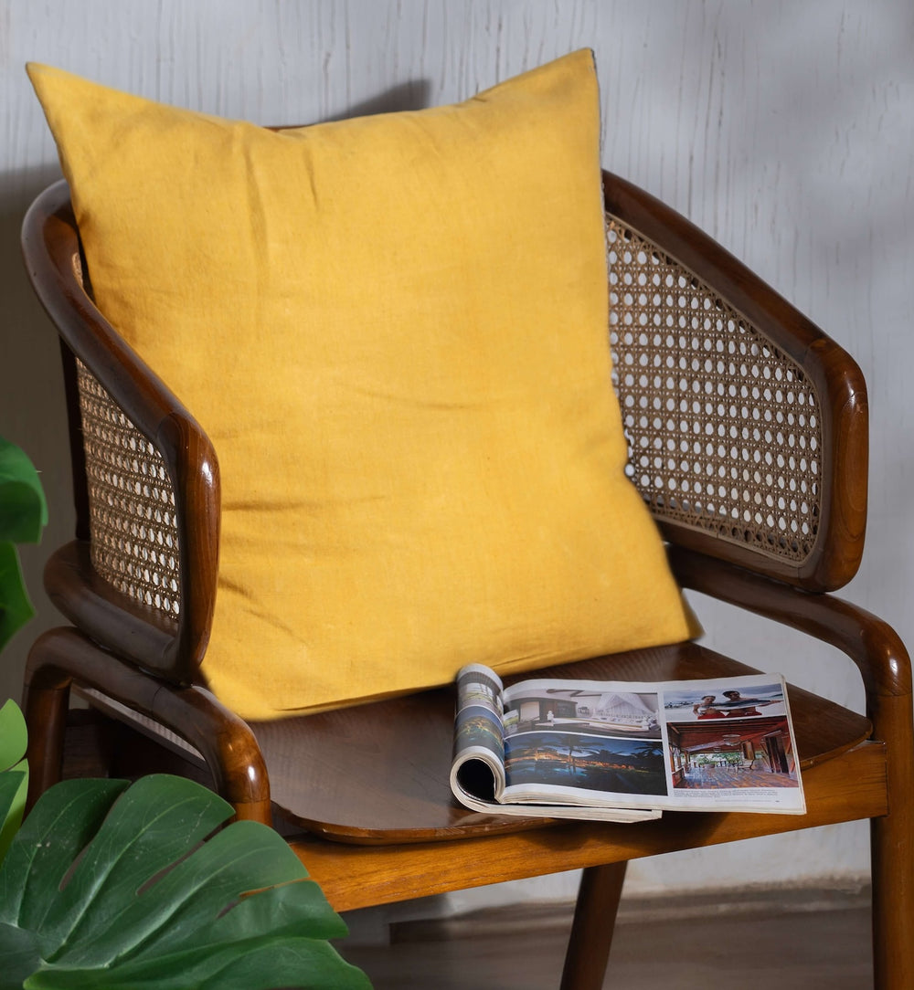 Nugget Gold Linen Cushion Cover on a Wooden Chair