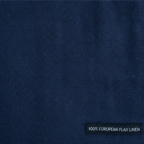 Navy blue fabric with a label indicating 100% Belgian linen.