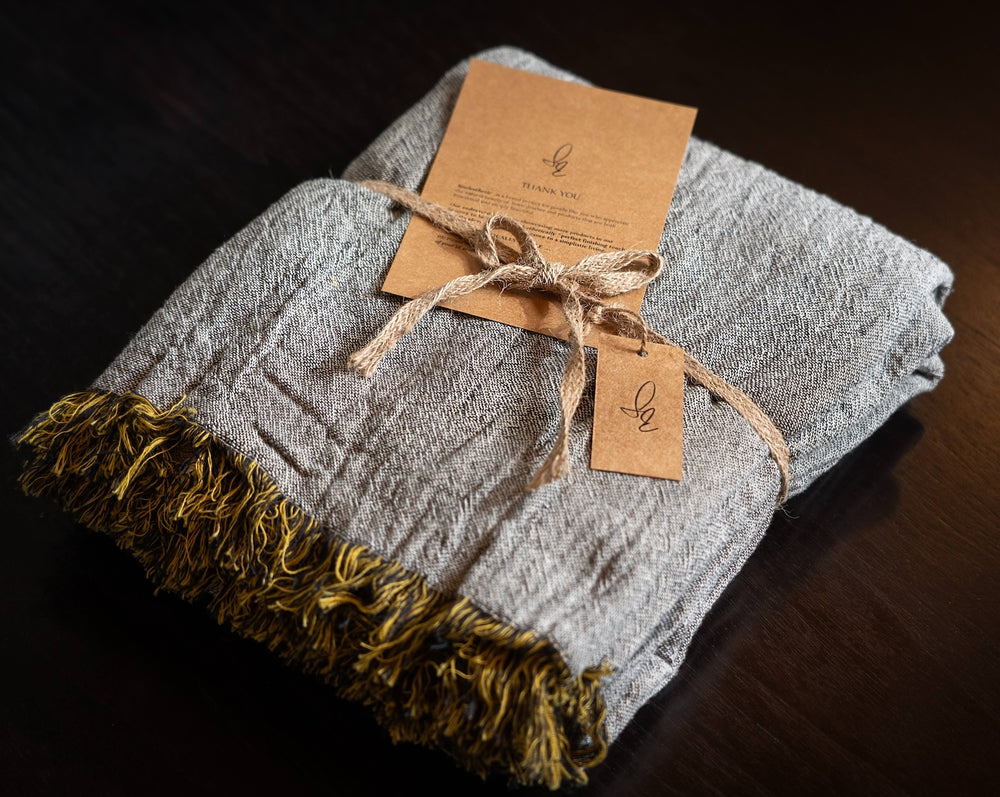 Packed Cotton Throw on Wooden Table