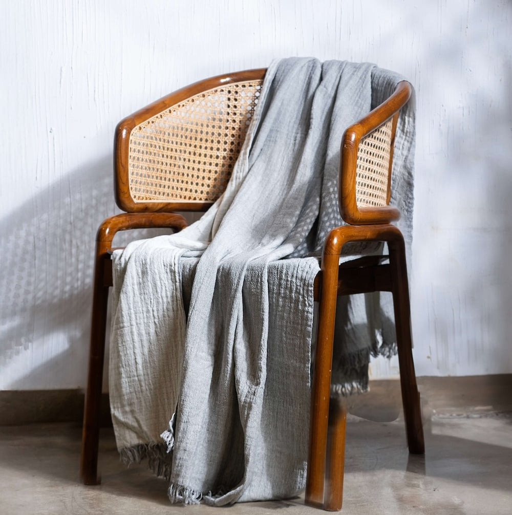 Tea Colored Throw on a Wooden Chair