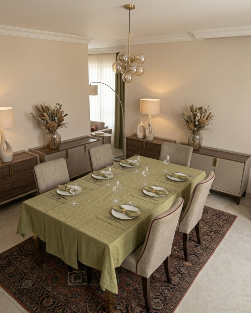 Dining room with a table set for dinner, chairs, and decorative elements.